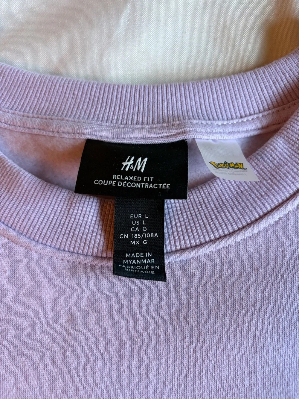 Pokémon Mew H&M Lavender Crewneck Sweater with Embroidered Cat Motif